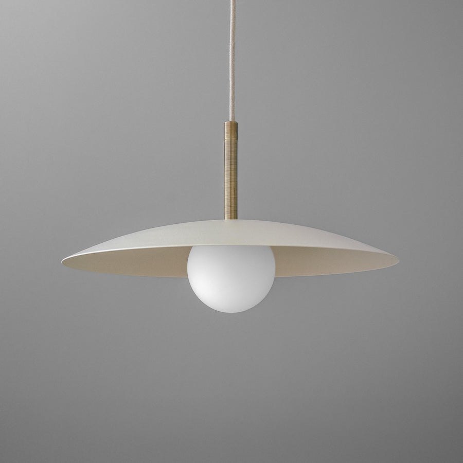 Minimal pendant light with wide beige metal disc shade and white globe bulb suspended by a slim rod. - PENDANT MODEL NO. 5693