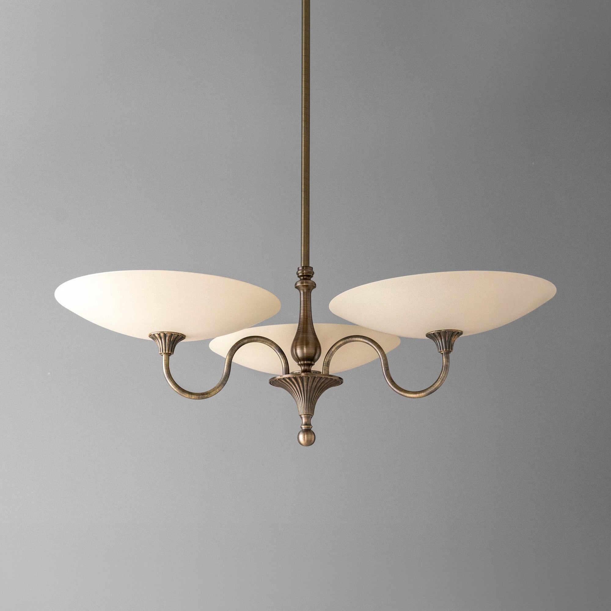 Antique brass chandelier with three cream glass globe shades and curved arms. - CHANDELIER MODEL NO. 1563