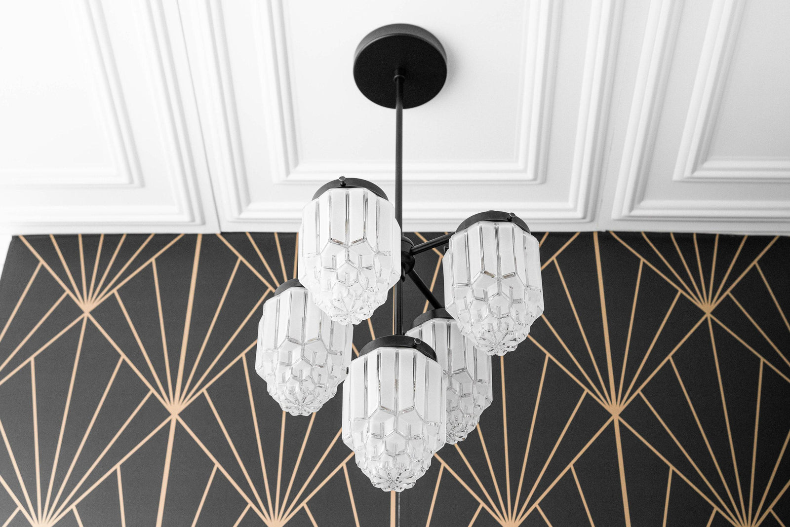 Black metal Art Deco chandelier with three globe-shaped glass shades hanging from ceiling mount. - CHANDELIER MODEL NO. 0777