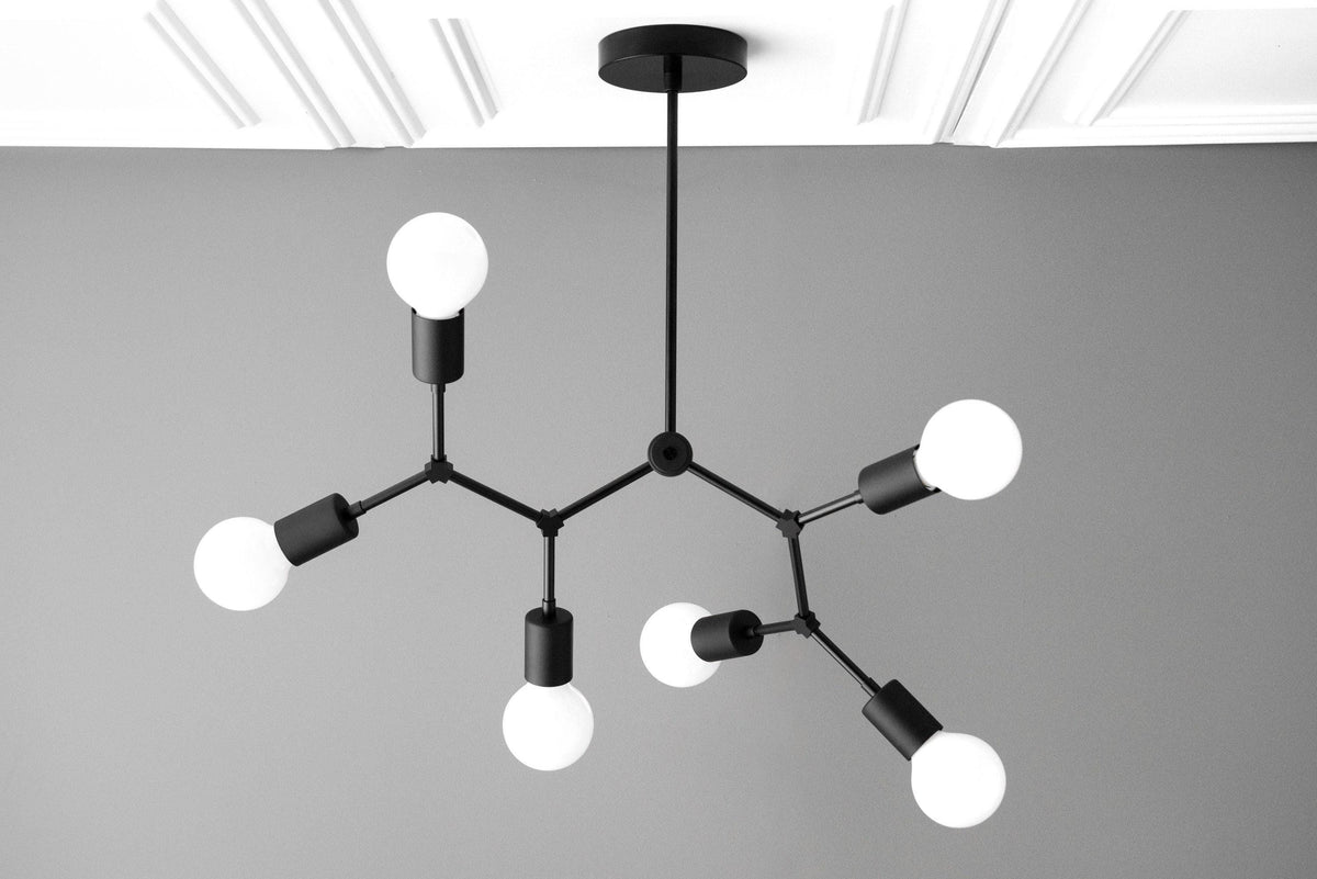 Black matte Art Deco chandelier with six exposed round white bulbs and angular arms. - CHANDELIER MODEL NO. 2523