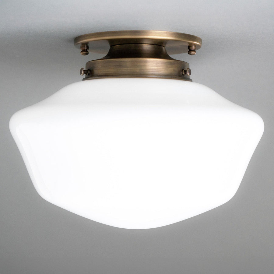 Flush mount ceiling light with antique brass fixture and white frosted glass globe shade. - CEILING LIGHT MODEL NO. 4340