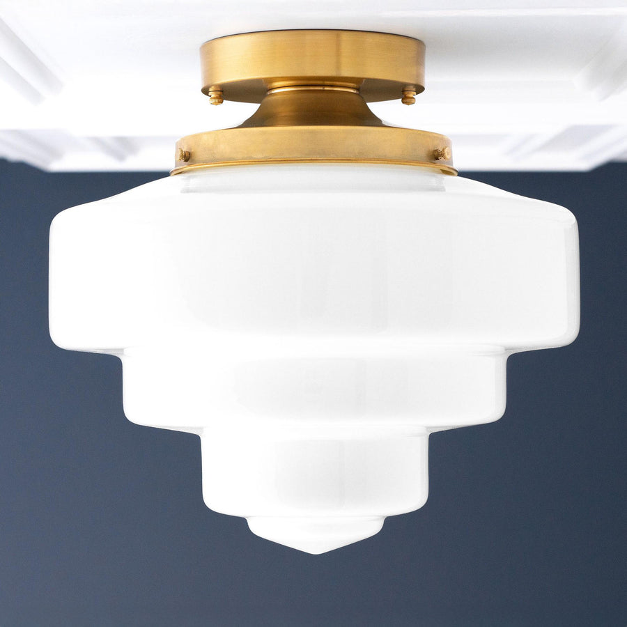 Art Deco stepped globe flush mount ceiling light with raw brass fixture. - CEILING LIGHT MODEL NO. 7458