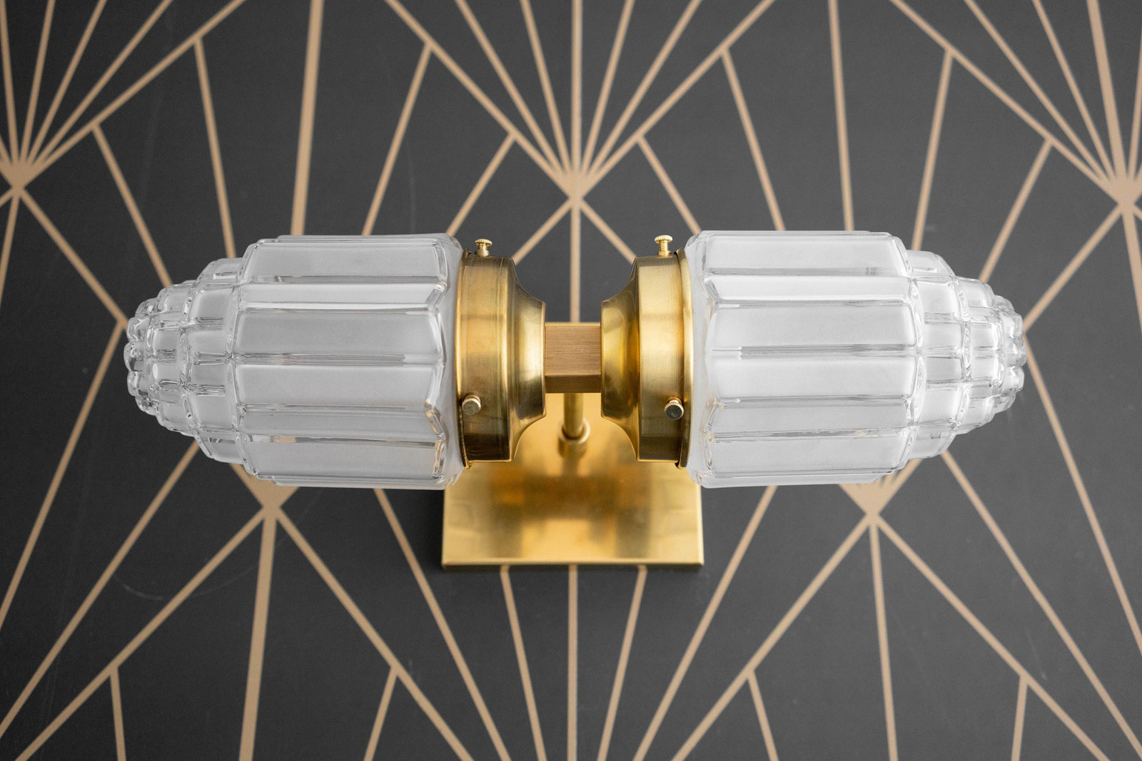 Art Deco brass wall sconce with two textured frosted glass globes and square backplate. - SCONCE MODEL NO. 7180