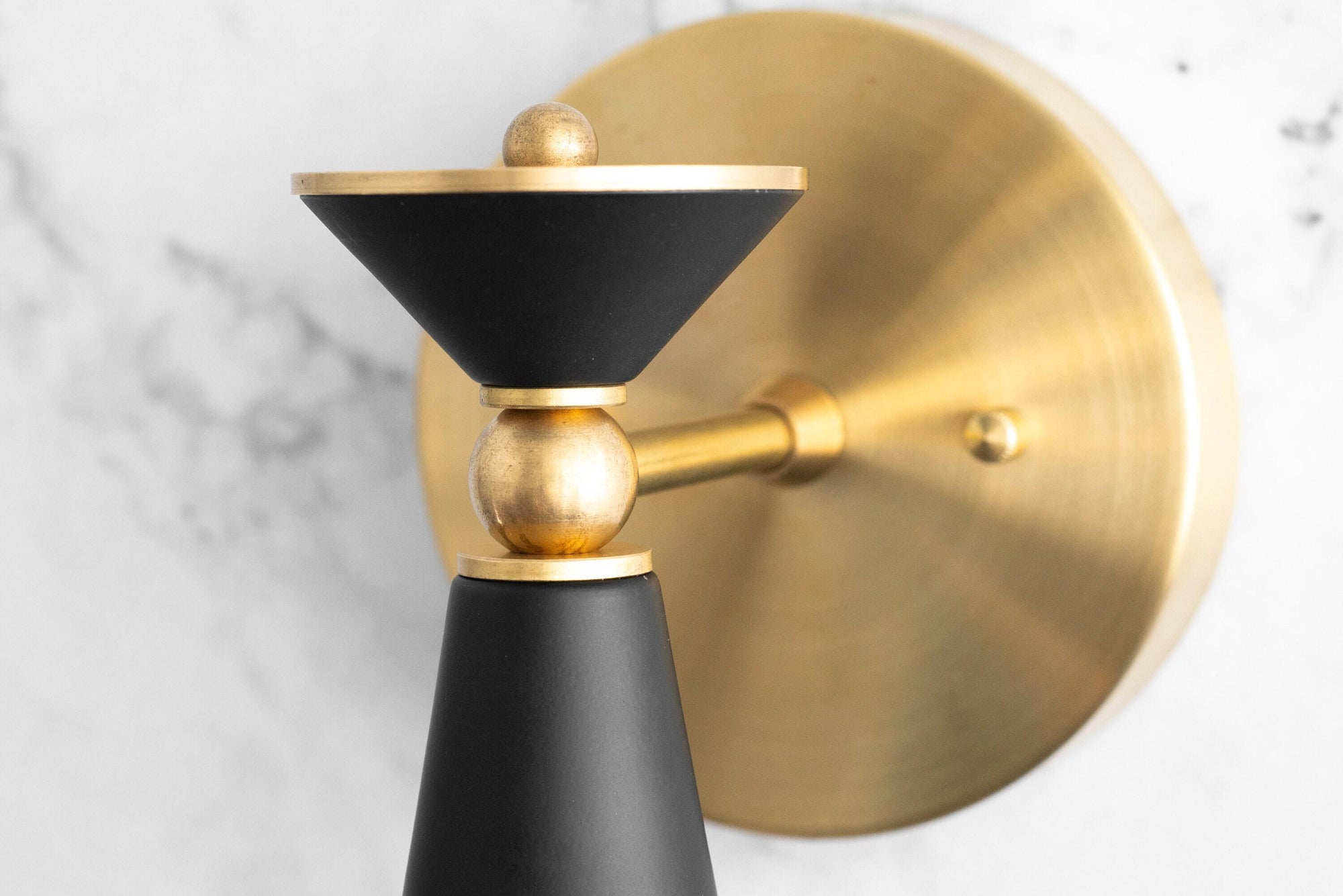 Art Deco brass and black metal sconce with cone and sphere design, bare bulb holder, semi-flush mount. - SCONCE MODEL NO. 8393