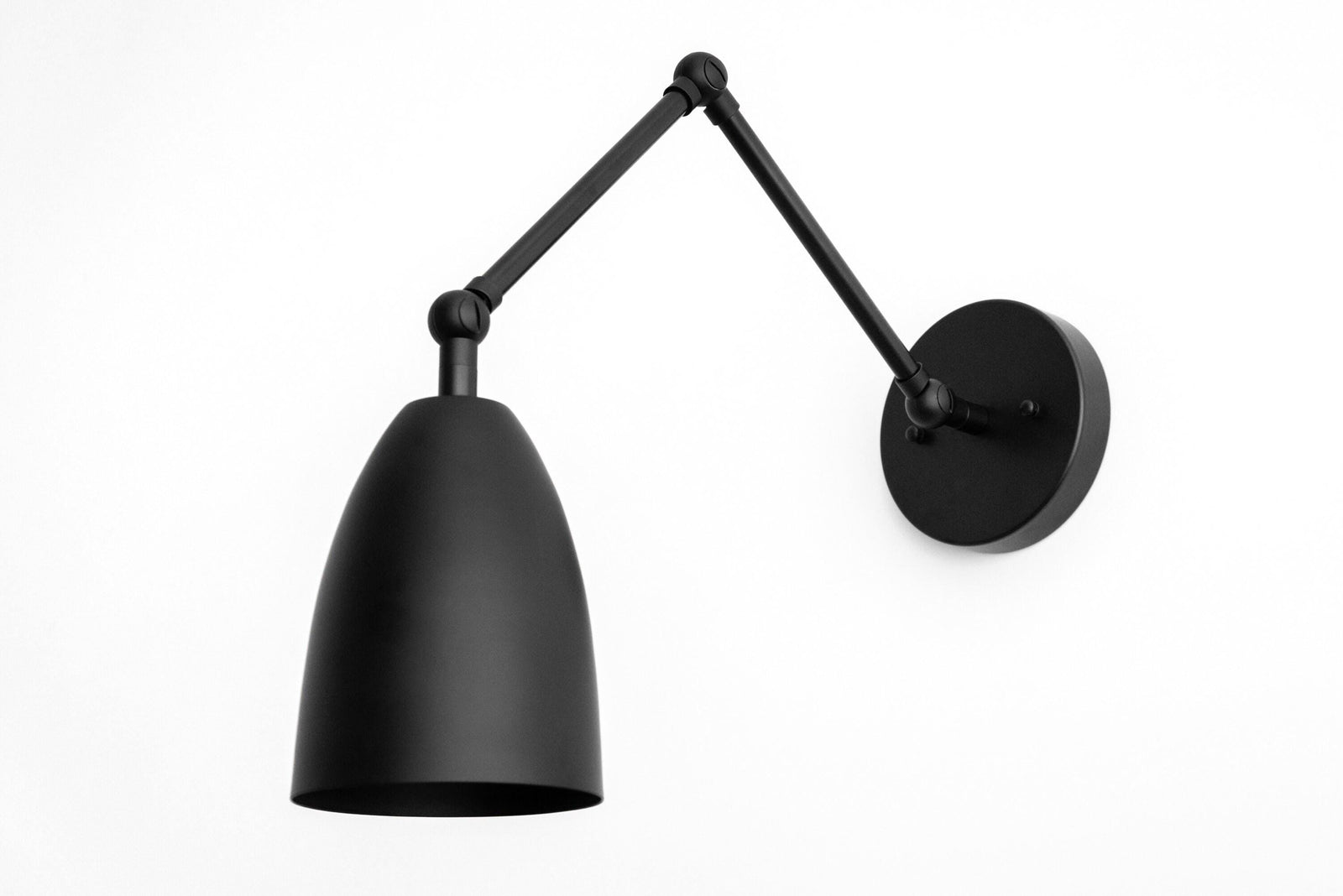 Matte black adjustable wall sconce with conical shade and Art Deco-inspired arm. - SCONCE MODEL NO. 0107