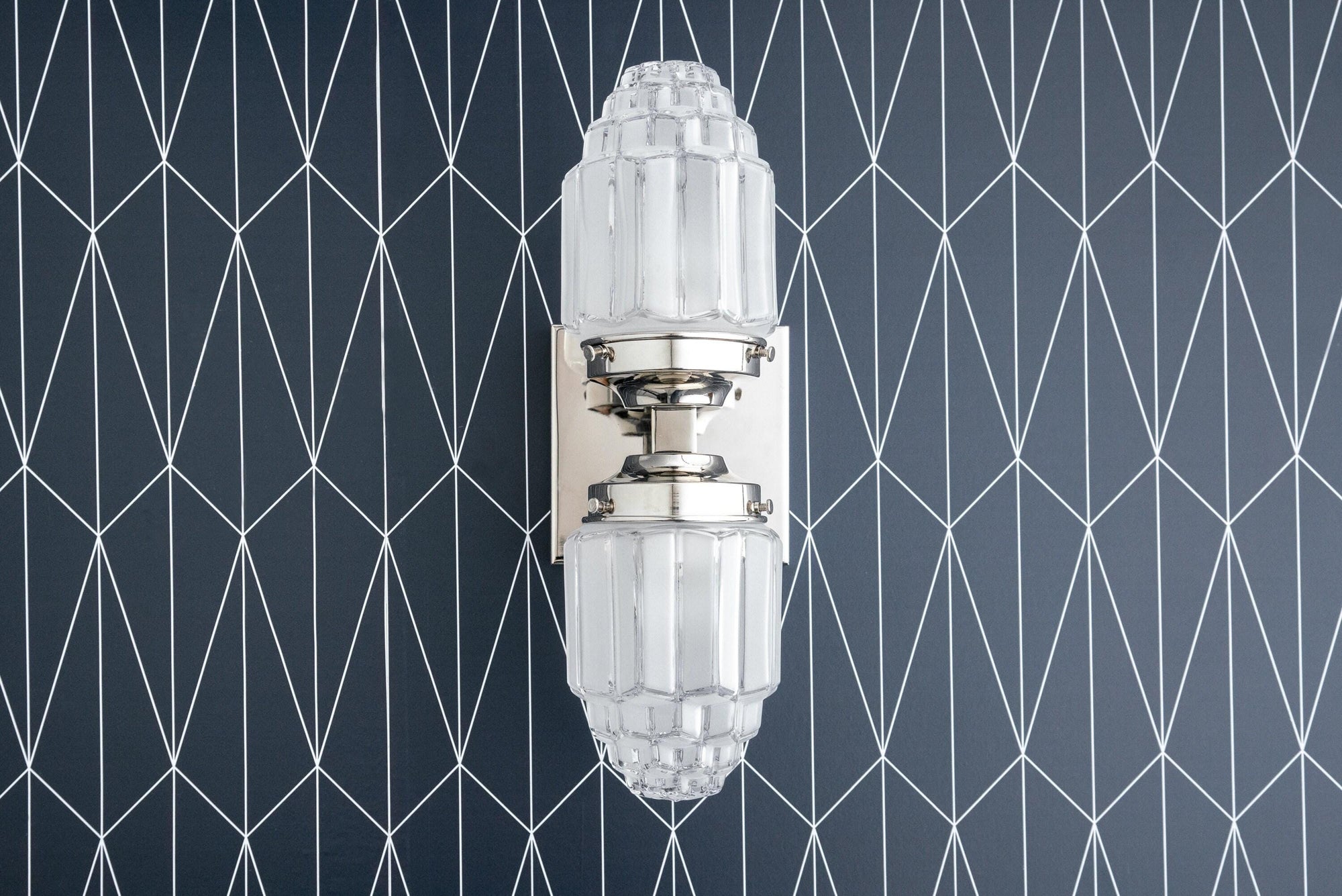 Polished nickel Art Deco wall sconce with ribbed glass globes and up/down lighting. - SCONCE MODEL NO. 7180