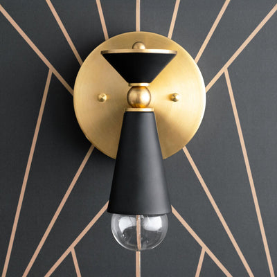 Art Deco style wall sconce with brass circular mount and black geometric metal shade over exposed bulb. - SCONCE MODEL NO. 8393