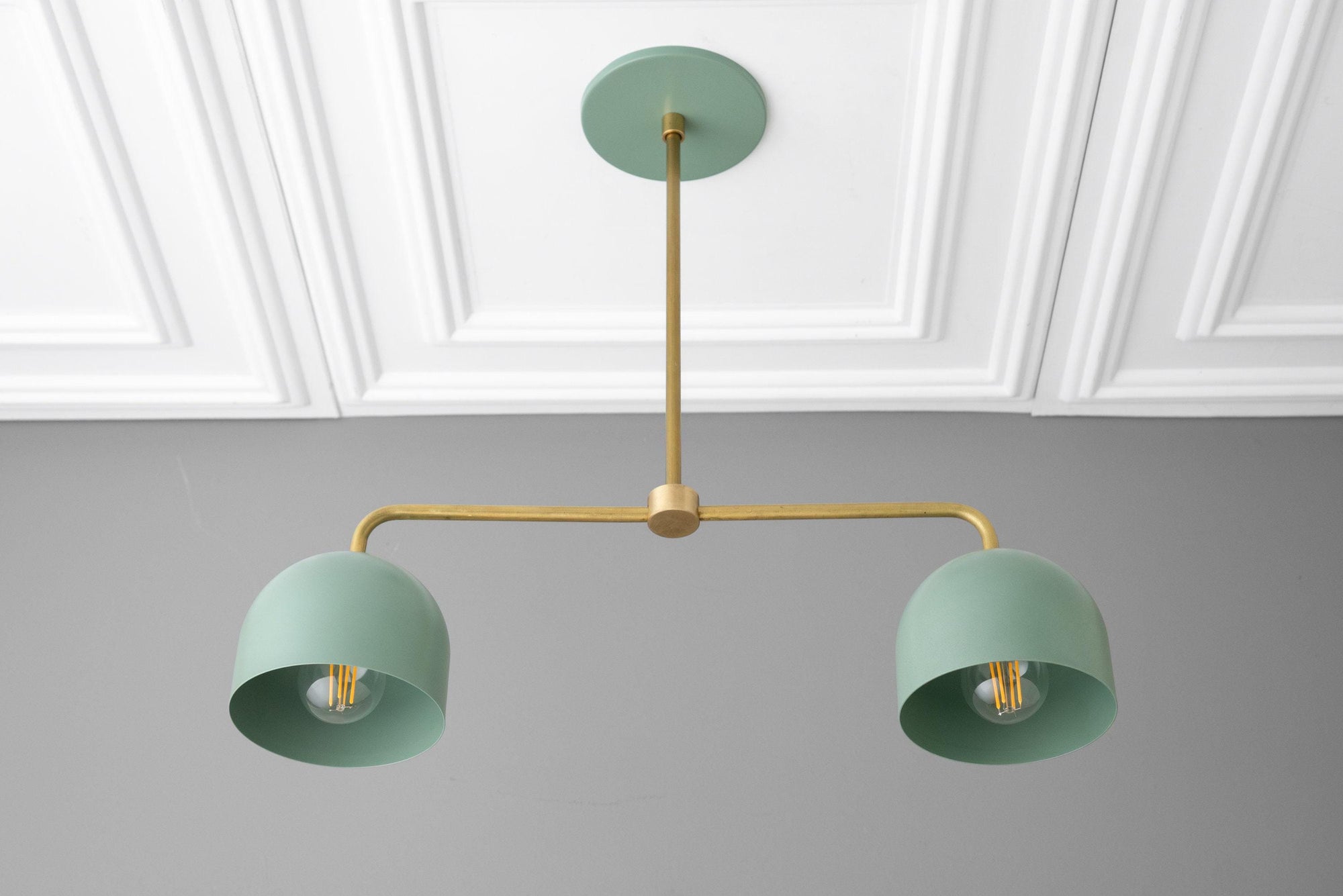 Green brass chandelier with two dome shades and adjustable horizontal arm. - CHANDELIER MODEL NO. 5719