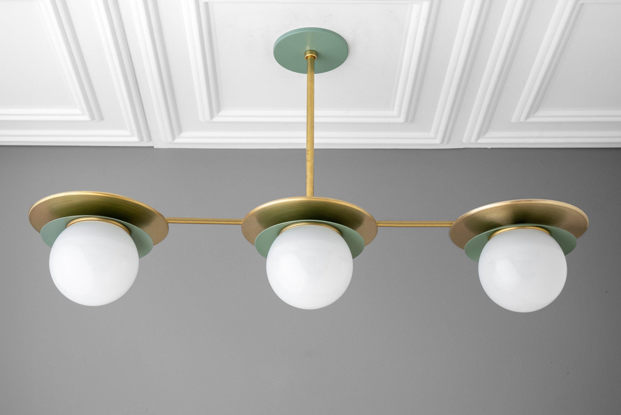 Mid-century modern chandelier with three green brass arms and white globe bulbs suspended from ceiling mount. - CHANDELIER MODEL NO. 7967