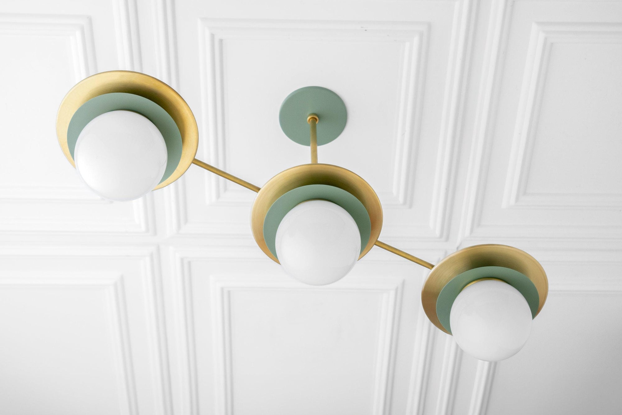Mid-century modern chandelier with three green and brass globe lights on a white coffered ceiling. - CHANDELIER MODEL NO. 7967