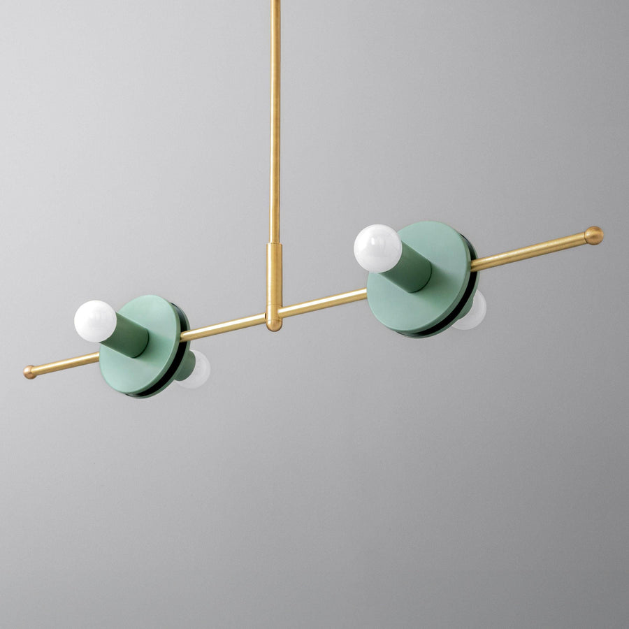 Scandinavian raw brass chandelier with two green matte shades and exposed white bulbs. - CHANDELIER MODEL NO. 3230