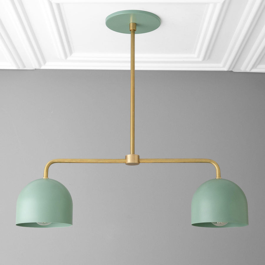 Green industrial-style chandelier with two dome-shaped shades and brass horizontal rod suspension. - CHANDELIER MODEL NO. 5719