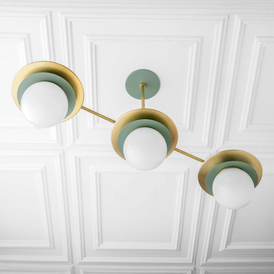 Mid-century modern chandelier with raw brass arms and green circular accents holding white globe bulbs. - CHANDELIER MODEL NO. 7967