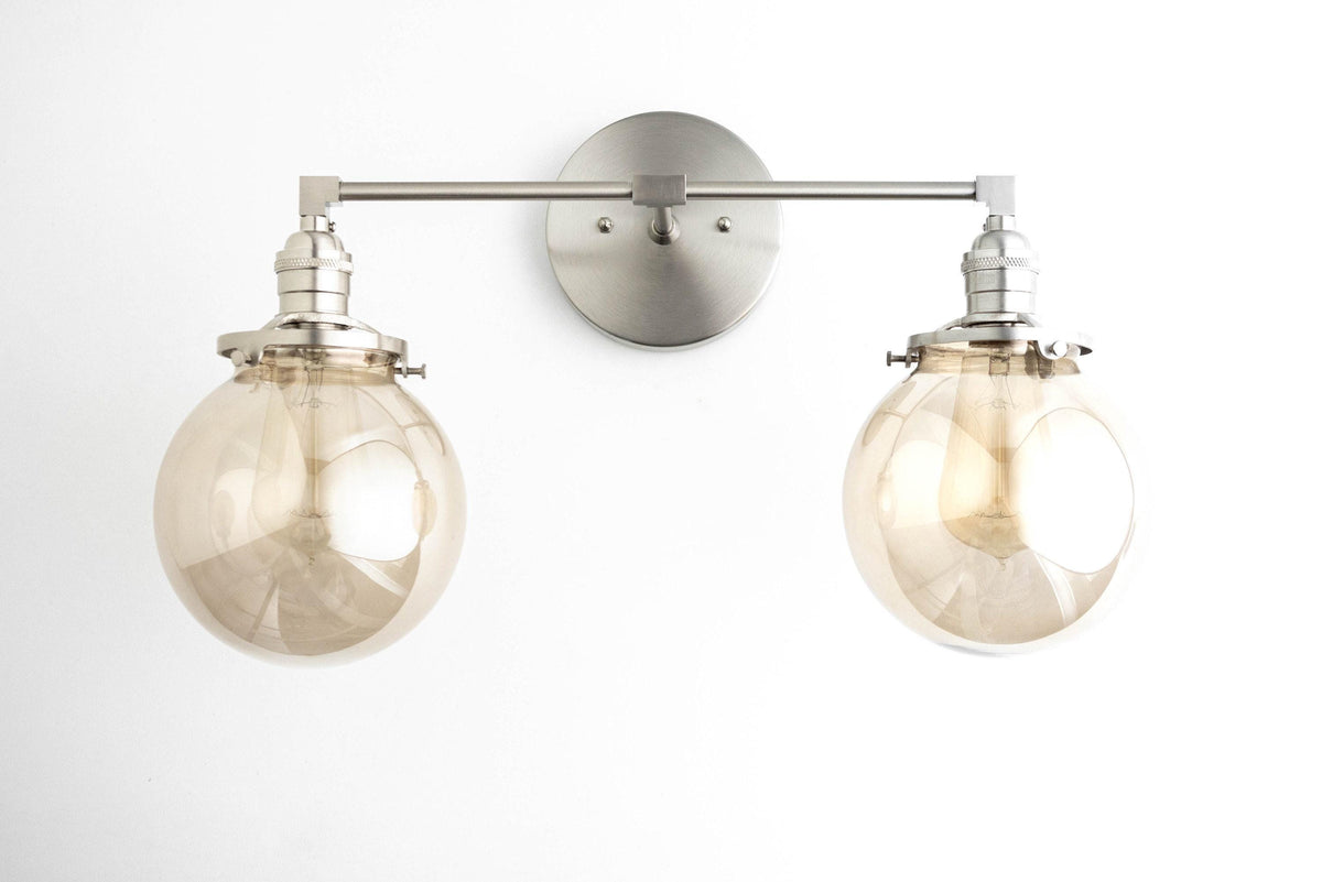 Mid-century modern 2-bulb vanity light with brushed nickel finish and clear globe shades. - VANITY LIGHT MODEL NO. 4270