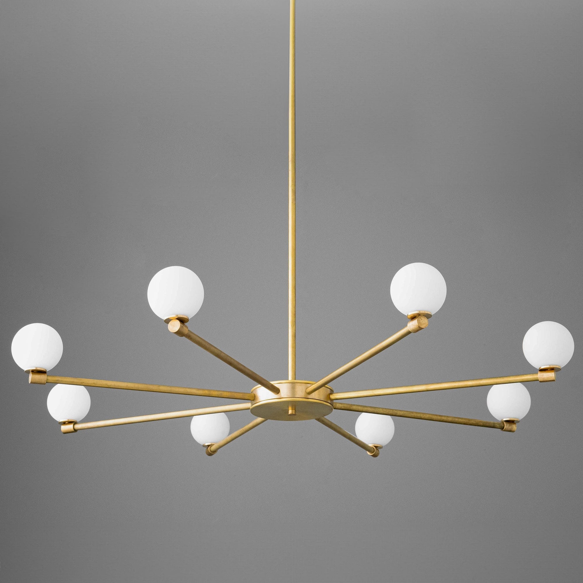 Raw brass chandelier with twelve white frosted glass globes in a starburst design. - CHANDELIER MODEL NO. 3192