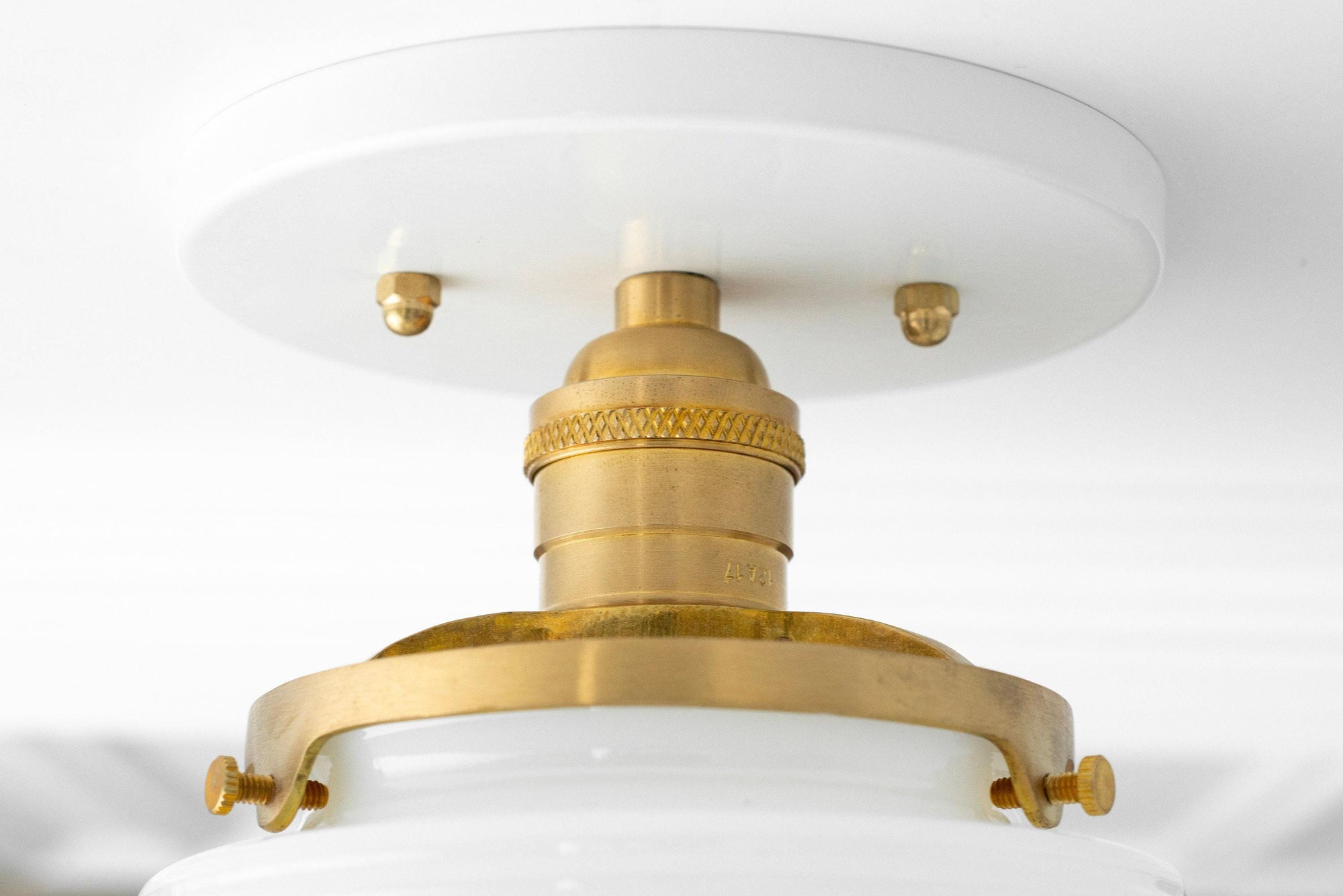 Mid-century modern semi-flush ceiling light with a white glass globe and raw brass hardware. - CEILING LIGHT MODEL NO. 8295