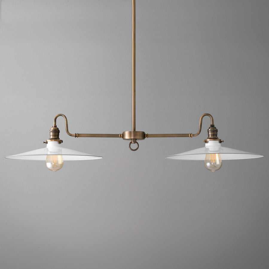 Antique brass industrial chandelier with two white metal shades and exposed bulbs. - CHANDELIER MODEL NO. 8785