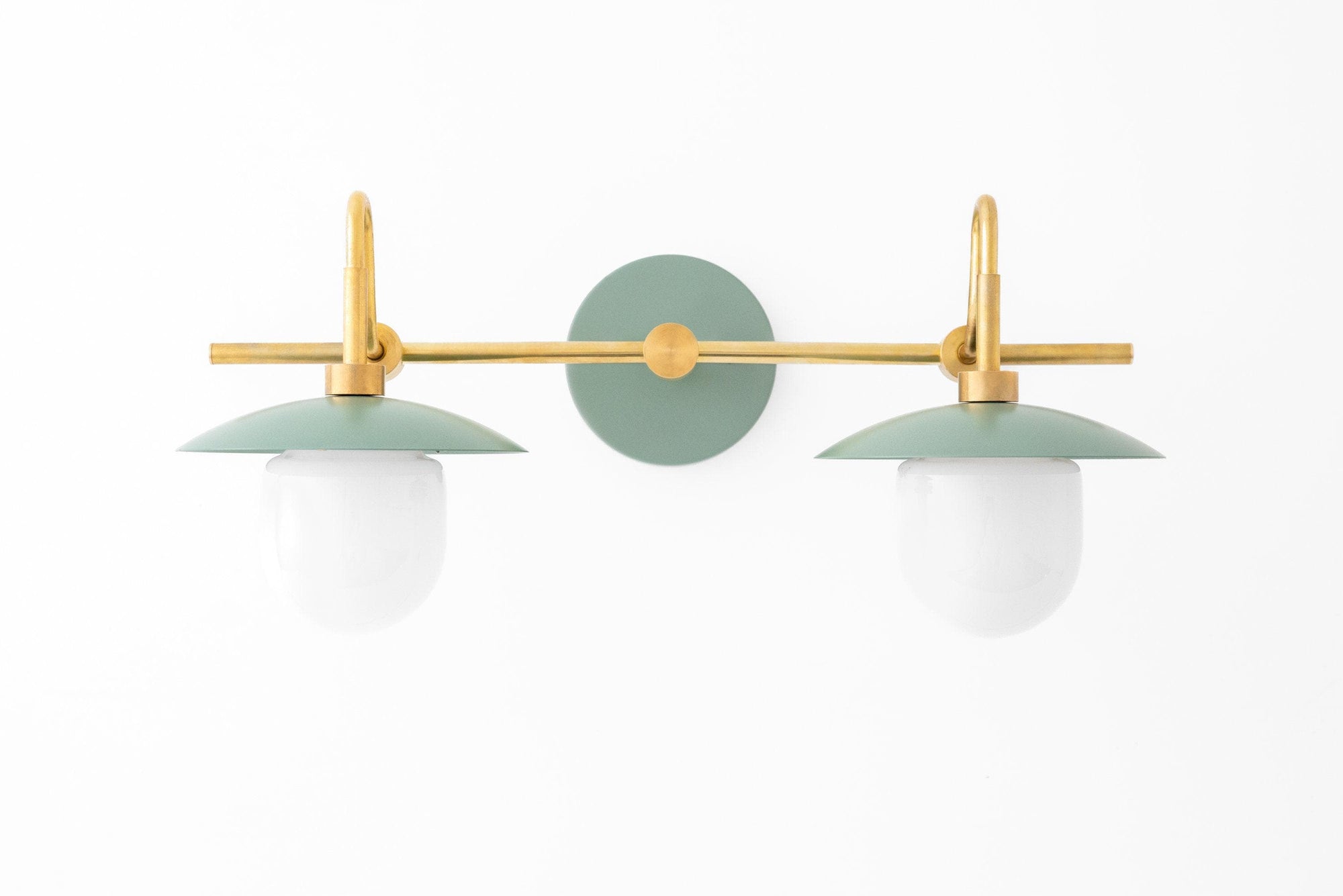 Raw brass and green vanity light with two globe bulbs and horizontal rod design. - VANITY LIGHT MODEL NO. 0347