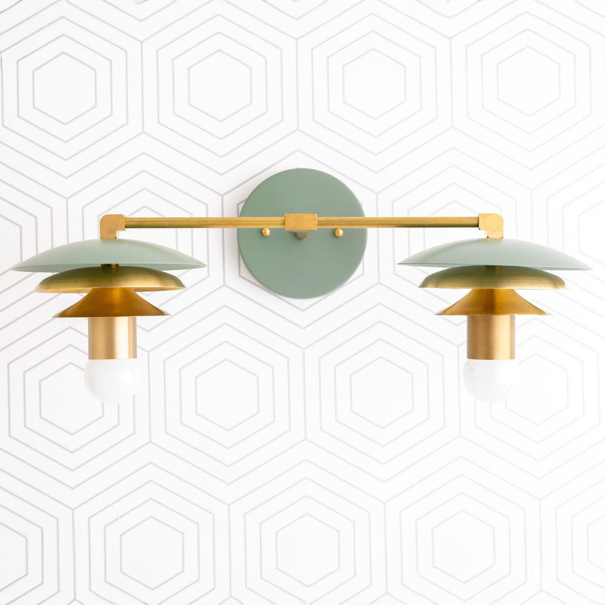 Raw brass and green Art Deco two-bulb vanity light with bare bulbs and round backplate. - VANITY LIGHT MODEL NO. 5806