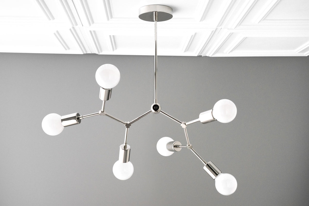 Polished nickel Art Deco chandelier with six exposed globe bulbs and angular arms. - CHANDELIER MODEL NO. 2523