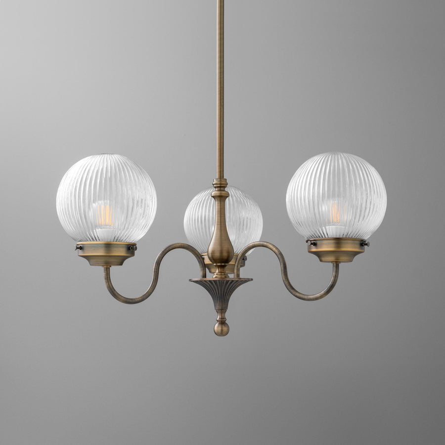 Three-light antique brass chandelier with ribbed clear glass globe shades and curving arms. - CHANDELIER MODEL NO. 2894