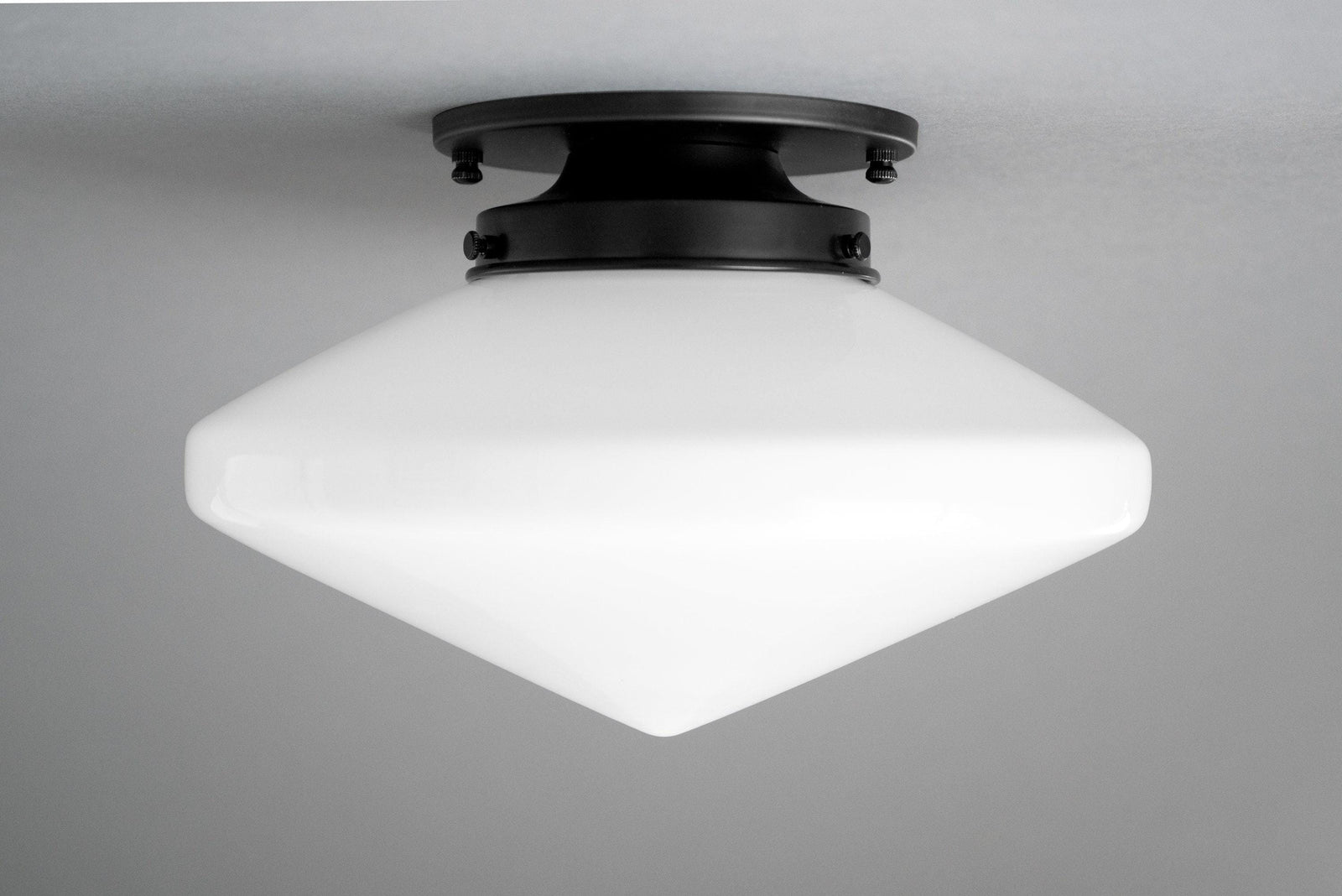 Art Deco flush mount ceiling light with matte black fixture and white tapered glass globe. - CEILING LIGHT MODEL NO. 5862
