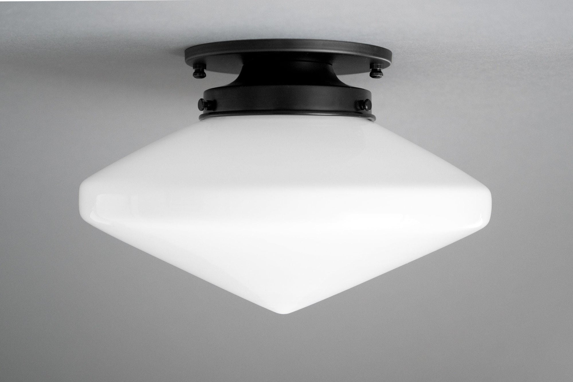 Art Deco flush mount ceiling light with matte black fixture and white tapered glass globe. - CEILING LIGHT MODEL NO. 5862