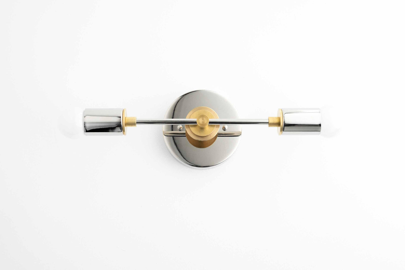 Wall-mounted vanity light with dual cylindrical shades in polished nickel and raw brass accents. - VANITY LIGHT MODEL NO. 8057
