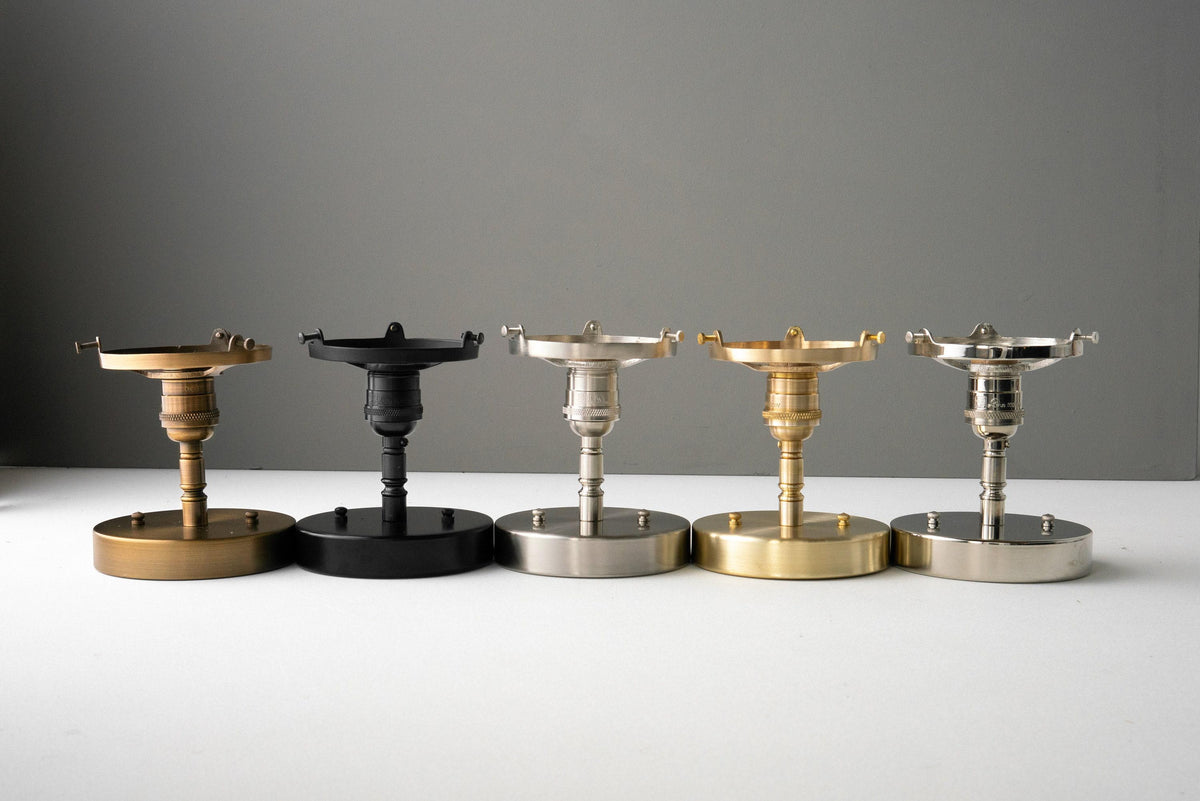 Five Art Deco semi-flush globe ceiling lights in raw brass, black, brushed nickel, antique brass, and polished nickel. - CEILING LIGHT MODEL NO. 4560