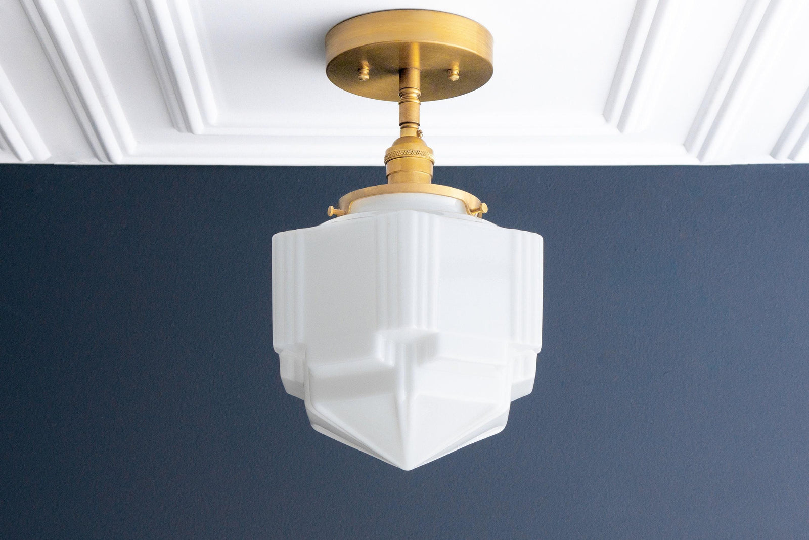 Art Deco semi-flush ceiling light with raw brass fixture and geometric white glass globe shade. - CEILING LIGHT MODEL NO. 4560
