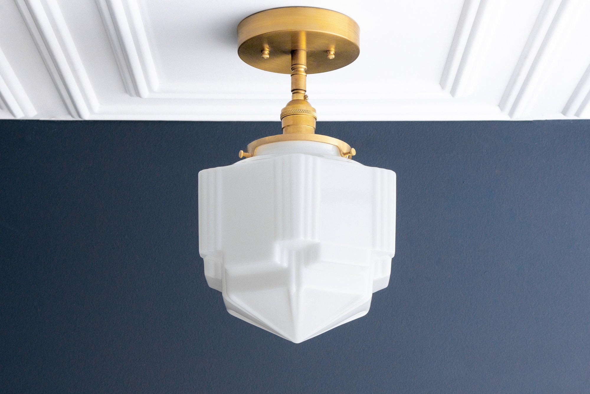 Art Deco semi-flush ceiling light with raw brass fixture and geometric white glass globe shade. - CEILING LIGHT MODEL NO. 4560