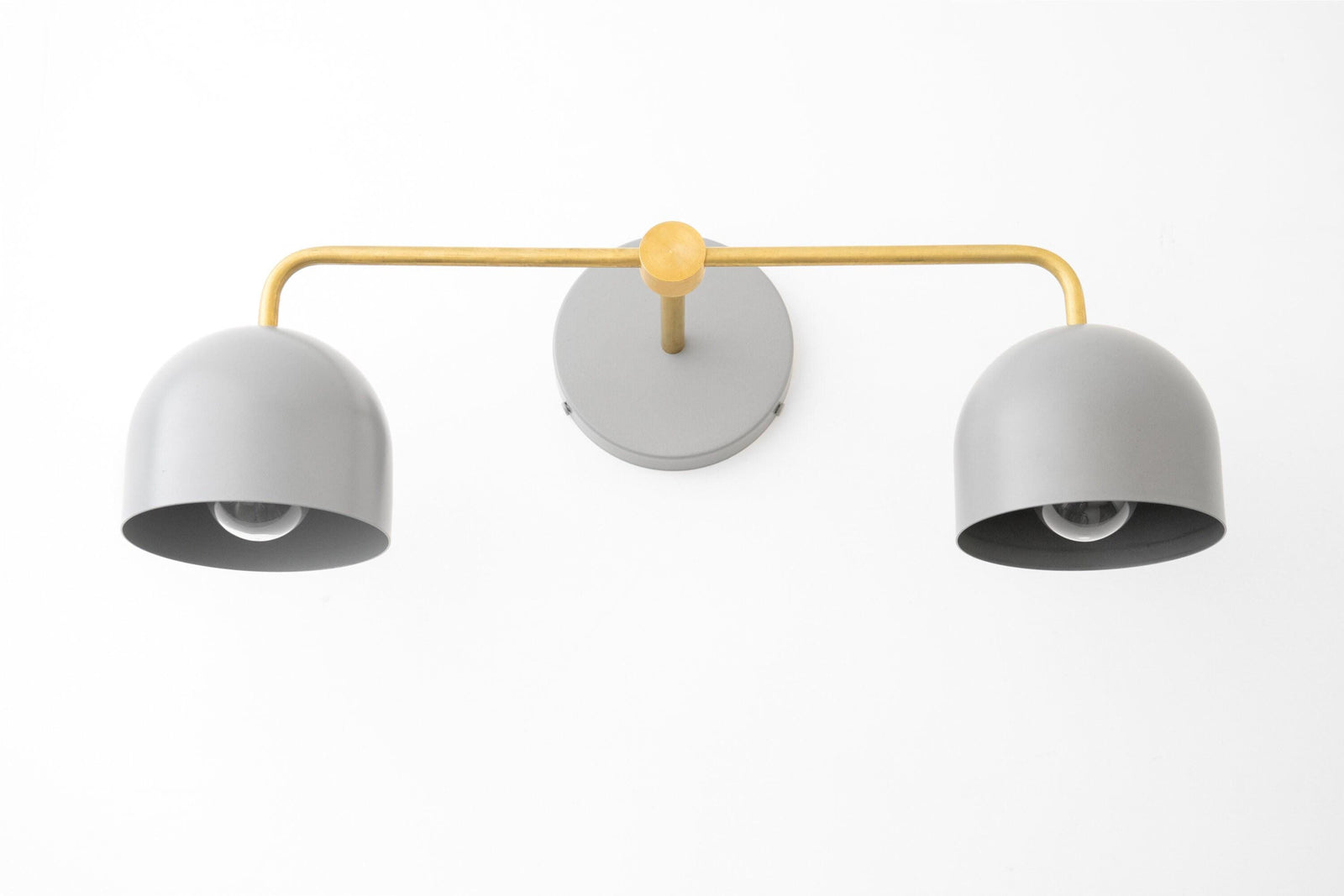 Raw brass vanity light with two smooth matte white dome shades and minimalist design. - VANITY LIGHT MODEL NO. 2082