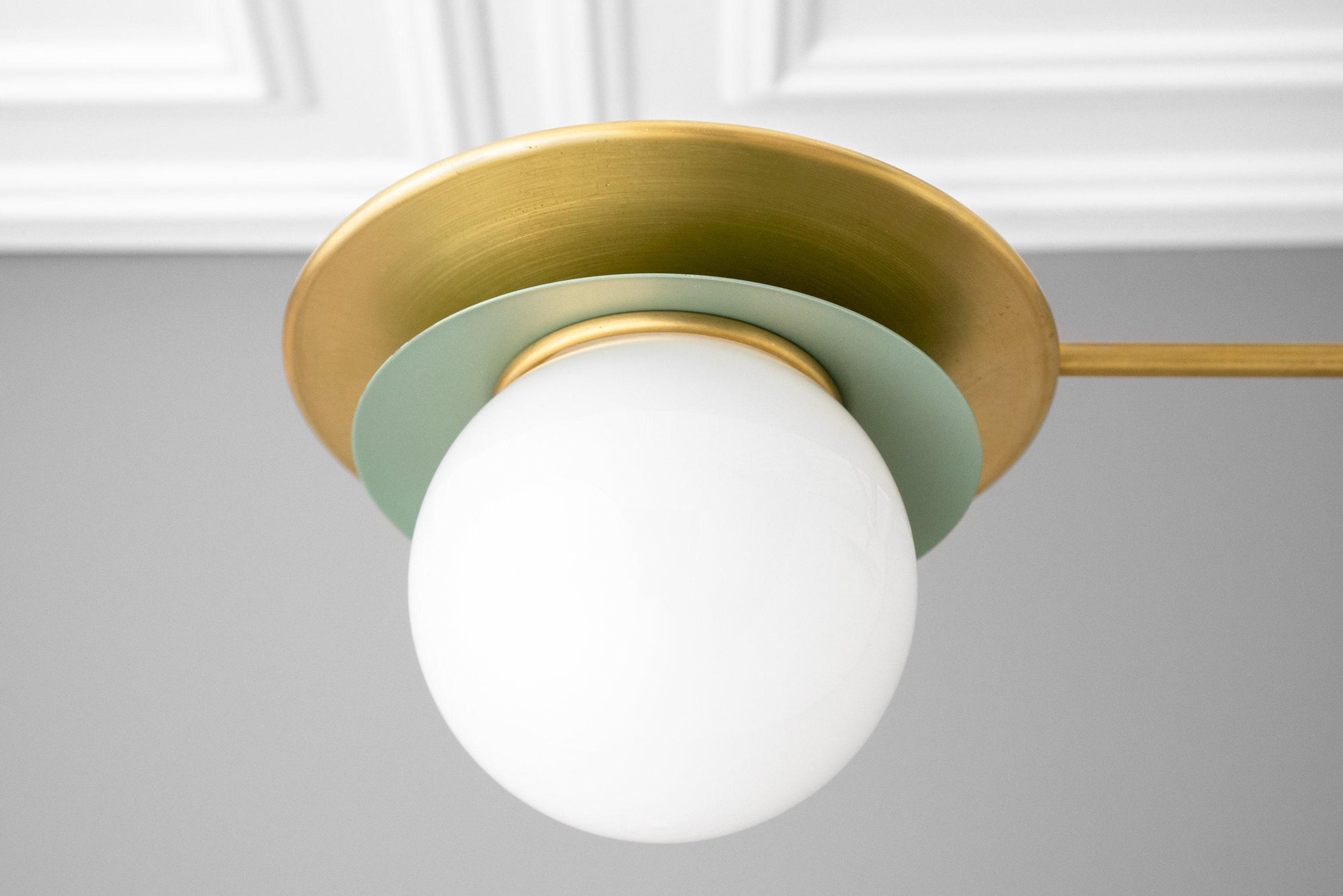 Mid century modern chandelier with white globe and brass-green circular accents. - CHANDELIER MODEL NO. 3792