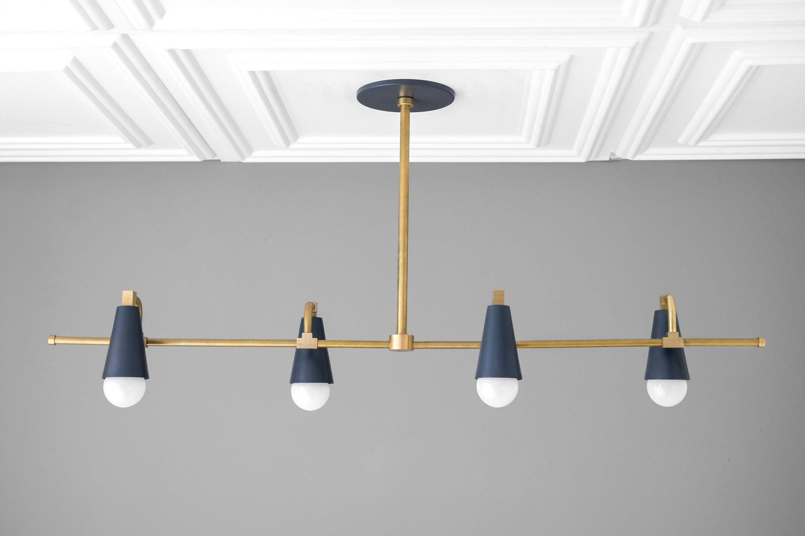 Art Deco chandelier with raw brass frame and coal blue tapered bare bulb sockets, 4-light design. - CHANDELIER MODEL NO. 1239