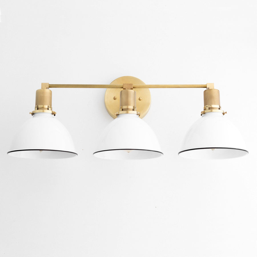 Mid-century modern 3-bulb vanity light with white metal shades and raw brass accents. - VANITY LIGHT MODEL NO. 2439