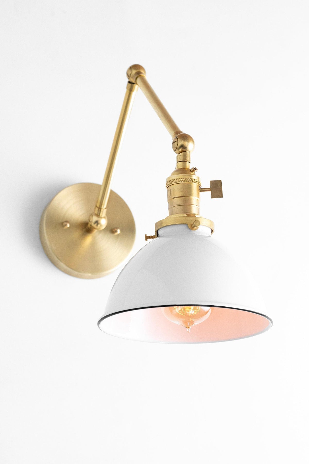 Mid-century modern wall sconce with adjustable raw brass arm and white conical shade. - SCONCE MODEL NO. 8551