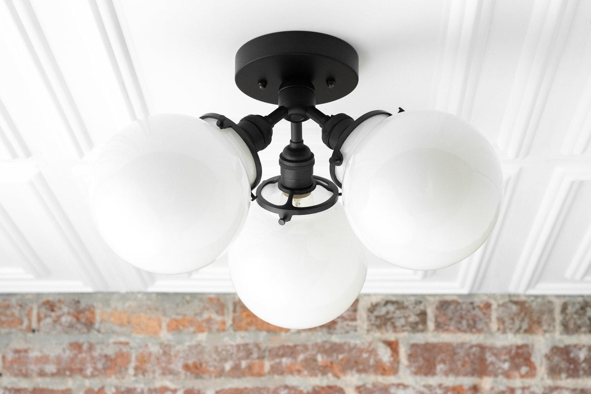 Mid-century modern flush mount ceiling light with three white glass globes and matte black metal fixture. - CEILING LIGHT MODEL NO. 0210