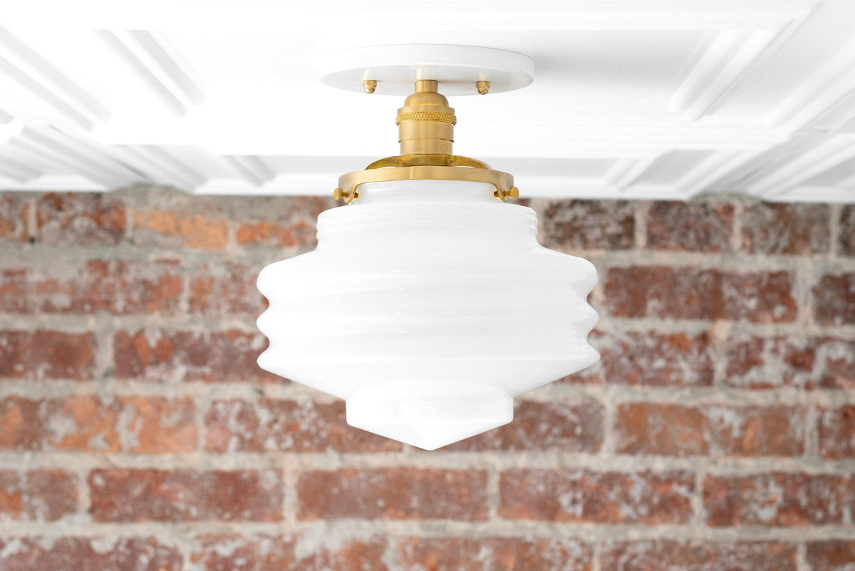 Mid-century modern semi-flush ceiling light with white stepped glass globe and raw brass fixture. - CEILING LIGHT MODEL NO. 8295
