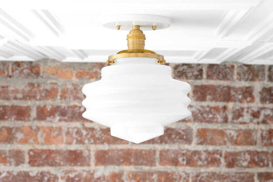 Mid-century modern semi-flush ceiling light with white stepped glass globe and raw brass fixture. - CEILING LIGHT MODEL NO. 8295