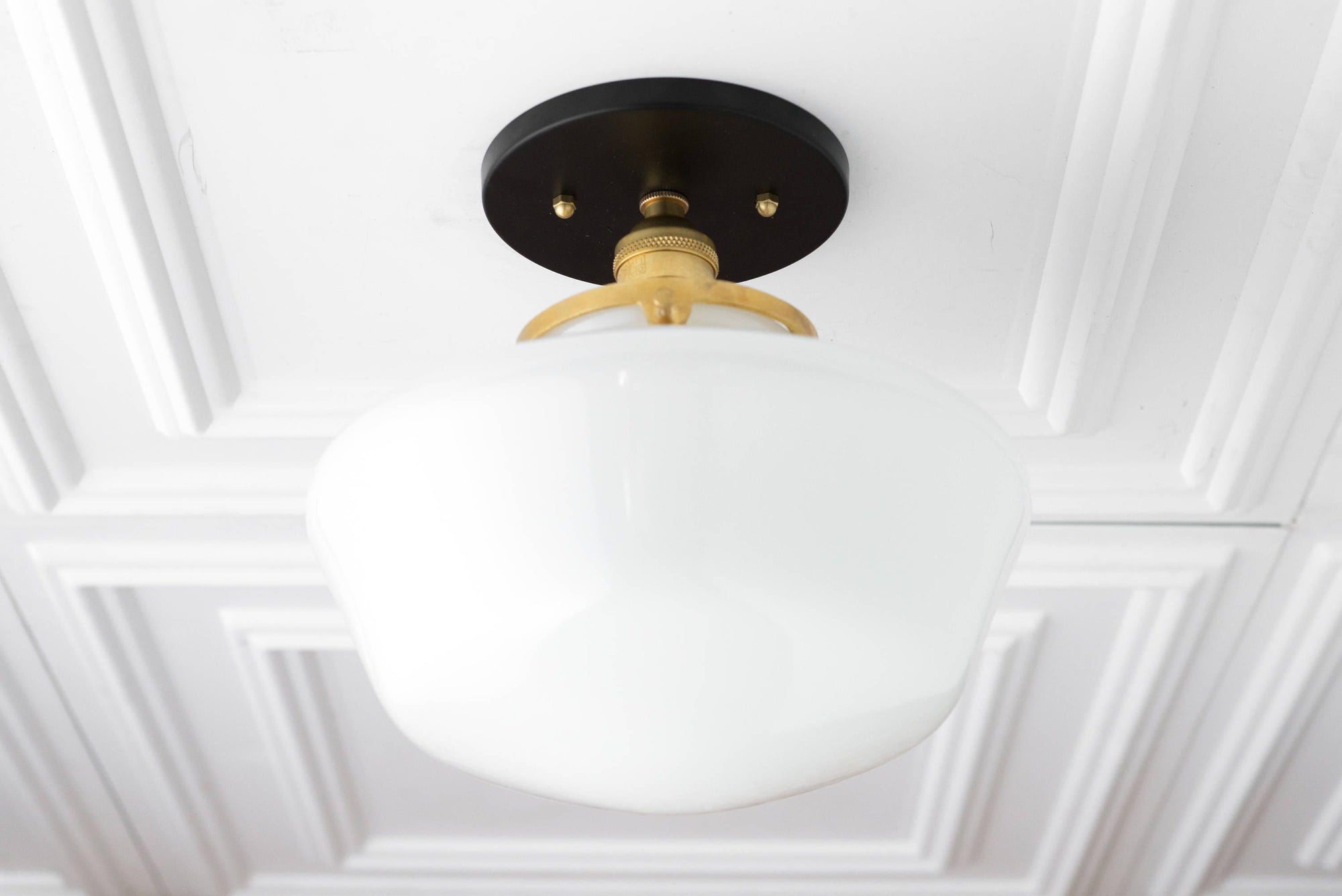 Mid-century modern semi-flush ceiling light with glossy white globe and black and raw brass fixture. - CEILING LIGHT MODEL NO. 5754