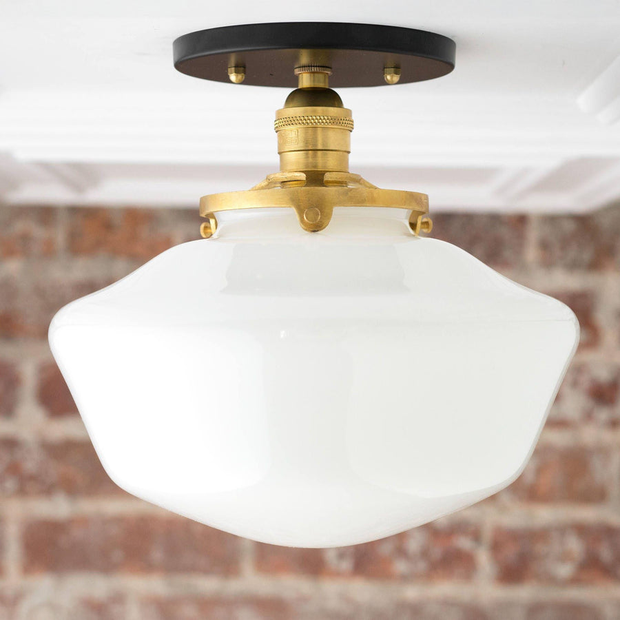 Semi-flush ceiling light with white glass globe and sealed brass fixture on black mount. - CEILING LIGHT MODEL NO. 5754