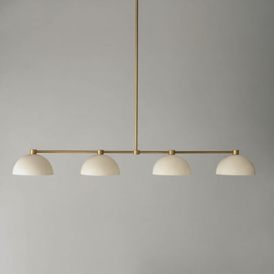 Antique brass linear chandelier with four cream dome shades suspended from a rod. - CHANDELIER MODEL NO. 4577