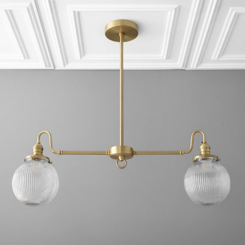 Antique brass linear chandelier with two ribbed glass globe shades and adjustable rod. - CHANDELIER MODEL NO. 7424
