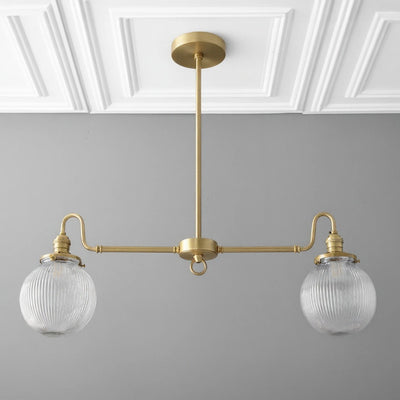 Antique brass linear chandelier with two ribbed glass globe shades and adjustable rod. - CHANDELIER MODEL NO. 7424