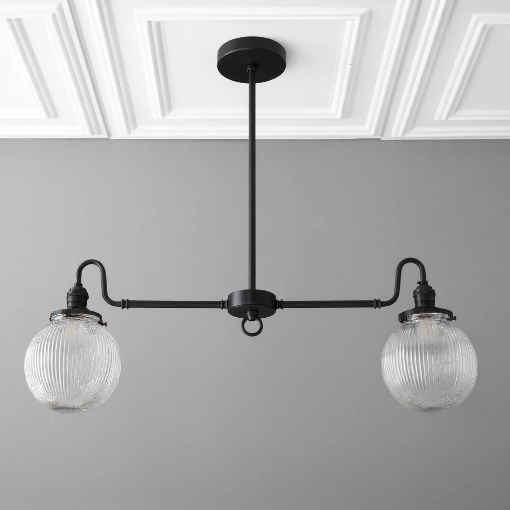 Black linear farmhouse chandelier with two ribbed globe glass shades and curved arms. - CHANDELIER MODEL NO. 7424