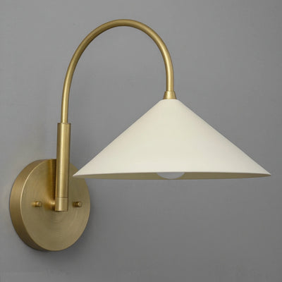 Antique brass wall sconce with curved arm and cream conical fabric shade. - Sconce Model No. 1583