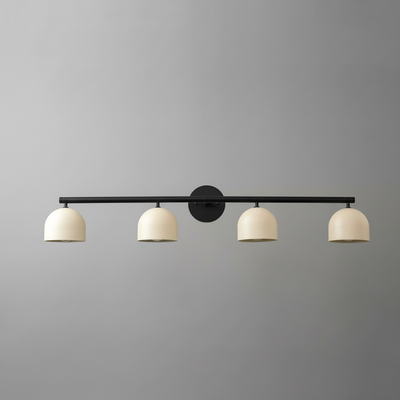 Four-light vanity fixture with matte black metal bar and cream dome-shaped shades on gray wall. - VANITY MODEL NO. 6448