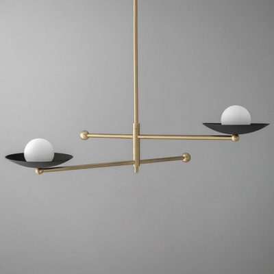 Minimalist industrial chandelier with two black metal disk shades and opaque white globe bulbs on brushed gold rods. - CHANDELIER MODEL NO. 2933