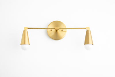 VANITY MODEL No. 1298- Mid Century Modern bathroom lighting with a Raw Brass finish. Designed and produced by MODCREATIONStudio at Peared Creation