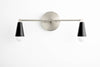 VANITY MODEL No. 1298- Mid Century Modern bathroom lighting with a Brushed Nickel/Black finish. Designed and produced by MODCREATIONStudio at Peared Creation